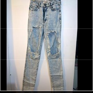 High waisted distressed jeans
